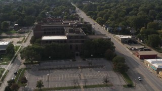 DX0002_170_017 - 5.7K aerial stock footage approach Omaha Adult High School in Omaha, Nebraska