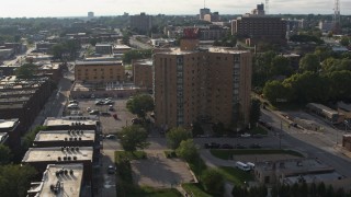 DX0002_170_032 - 5.7K aerial stock footage of an apartment building in Omaha, Nebraska