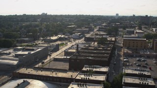 DX0002_170_036 - 5.7K aerial stock footage orbit apartment buildings and Leavenworth Avenue in Omaha, Nebraska