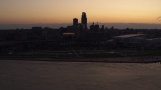 DX0002_172_040 - 5.7K aerial stock footage of the skyline, arena and convention center at twilight, Downtown Omaha, Nebraska