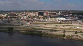 DX0002_174_016 - 5.7K aerial stock footage of flying by I-29 with a view of Downtown Sioux City, Iowa