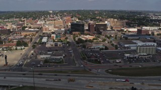 DX0002_174_018 - 5.7K aerial stock footage a view of office buildings while passing by I-29, Downtown Sioux City, Iowa
