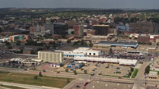 DX0002_174_033 - 5.7K aerial stock footage slowly approach hotel and office buildings in Downtown Sioux City, Iowa