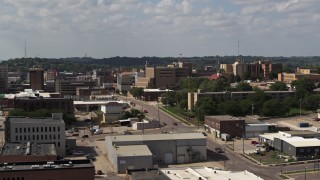 DX0002_175_018 - 5.7K aerial stock footage flyby 5th Street while focused on hospital, Downtown Sioux City, Iowa