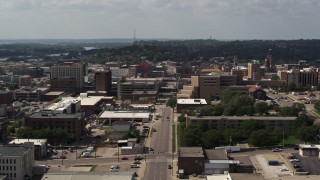 DX0002_175_022 - 5.7K aerial stock footage flying by office buildings, 5th Street, and hospital, Downtown Sioux City, Iowa
