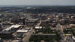 DX0002_175_023 - 5.7K aerial stock footage a stationary view of office buildings and hospital, Downtown Sioux City, Iowa
