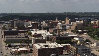 DX0002_175_026 - 5.7K aerial stock footage flyby and away from office and city buildings, Downtown Sioux City, Iowa