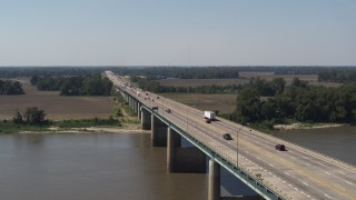 DX0002_177_025 - 5.7K aerial stock footage ascending from the bridge to Arkansas spanning the Mississippi River