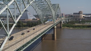 DX0002_177_026 - 5.7K aerial stock footage stationary view of cars crossing the bridge to Memphis, Tennessee