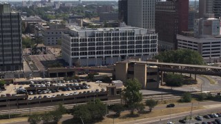 DX0002_177_033 - 5.7K aerial stock footage of view of city hall in Downtown Memphis, Tennessee during descent
