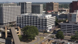 DX0002_177_038 - 5.7K aerial stock footage of flying toward city hall in Downtown Memphis, Tennessee
