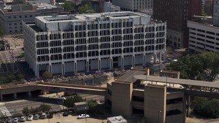DX0002_177_039 - 5.7K aerial stock footage of a close orbit of city hall in Downtown Memphis, Tennessee