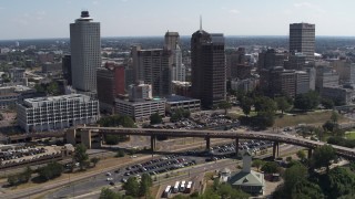 DX0002_178_002 - 5.7K aerial stock footage reverse view of the skyline from the river in Downtown Memphis, Tennessee