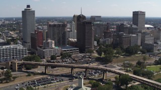 DX0002_178_009 - 5.7K aerial stock footage of flying toward office towers in the Downtown Memphis, Tennessee skyline