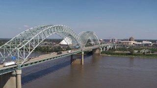 DX0002_178_025 - 5.7K aerial stock footage orbit light traffic traveling on the bridge, Memphis, Tennessee