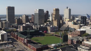 DX0002_179_002 - 5.7K stock footage aerial video of orbit tall office towers and baseball stadium in Downtown Memphis, Tennessee