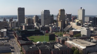 DX0002_179_003 - 5.7K stock footage aerial video of a wide orbit tall office towers and a baseball stadium in Downtown Memphis, Tennessee
