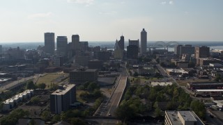DX0002_179_032 - 5.7K aerial stock footage ascend and approach high-rise office buildings in Downtown Memphis, Tennessee skyline