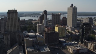 DX0002_180_002 - 5.7K stock footage aerial video passing high-rise office buildings in Downtown Memphis, Tennessee