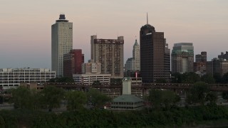 DX0002_181_028 - 5.7K aerial stock footage office and apartment high-rises at sunset in Downtown Memphis, Tennessee