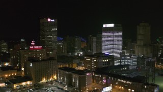 DX0002_182_030 - 5.7K aerial stock footage of the One Commerce Square and First Tennessee Building office towers at night in Downtown Memphis, Tennessee