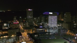DX0002_182_033 - 5.7K aerial stock footage approach One Commerce Square and First Tennessee Building at night in Downtown Memphis, Tennessee
