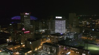 DX0002_182_035 - 5.7K aerial stock footage stationary view of One Commerce Square and First Tennessee Building at night in Downtown Memphis, Tennessee