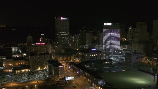DX0002_182_055 - 5.7K aerial stock footage view of One Commerce Square and First Tennessee Building at night, slow descent, Downtown Memphis, Tennessee
