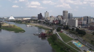 DX0002_183_001 - 5.7K aerial stock footage of approaching the city skyline from the Mississippi River, Downtown Memphis, Tennessee