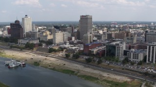 DX0002_183_003 - 5.7K aerial stock footage of reverse view of One Commerce Square and office buildings, Downtown Memphis, Tennessee