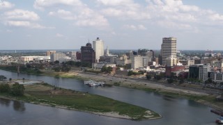 DX0002_183_004 - 5.7K aerial stock footage of flying by and away from the city's skyline, Downtown Memphis, Tennessee