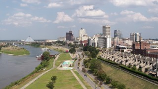 DX0002_183_018 - 5.7K aerial stock footage the city's skyline and Wolf River Harbor during descent, Downtown Memphis, Tennessee