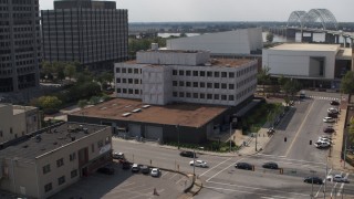 DX0002_183_033 - 5.7K aerial stock footage approach and slowly orbit the Federal Reserve Bank in Downtown Memphis, Tennessee