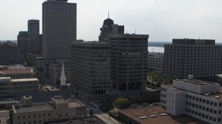 DX0002_184_008 - 5.7K aerial stock footage of a county government building and police station in Downtown Memphis, Tennessee