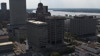 DX0002_184_009 - 5.7K aerial stock footage of orbiting a county government building and police station in Downtown Memphis, Tennessee