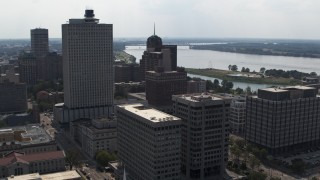 DX0002_184_013 - 5.7K aerial stock footage reverse view of office high-rise, a county building and police station in Downtown Memphis, Tennessee