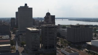 DX0002_184_014 - 5.7K aerial stock footage of approaching a county building and police station in Downtown Memphis, Tennessee