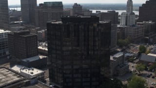 DX0002_184_030 - 5.7K aerial stock footage of flying away from courthouse and office building in Downtown Memphis, Tennessee