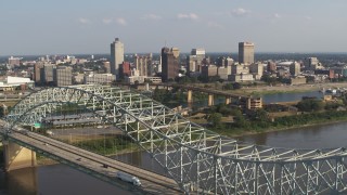 DX0002_185_007 - 5.7K aerial stock footage focus on skyline while descending by the bridge, Downtown Memphis, Tennessee
