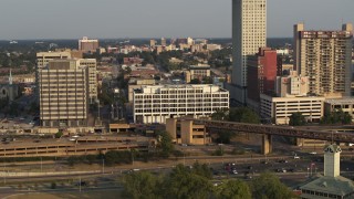 DX0002_185_041 - 5.7K aerial stock footage of Memphis City Hall at sunset, Downtown Memphis, Tennessee
