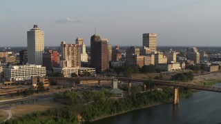 DX0002_186_006 - 5.7K aerial stock footage of circling the downtown skyline at sunset, Downtown Memphis, Tennessee