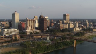 DX0002_186_007 - 5.7K aerial stock footage orbit downtown skyline at sunset, Downtown Memphis, Tennessee