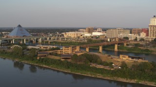 DX0002_186_013 - 5.7K aerial stock footage orbit and approach museum at sunset, Downtown Memphis, Tennessee