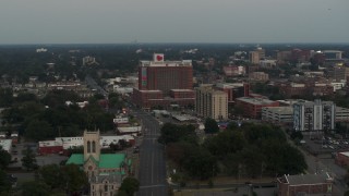 DX0002_186_043 - 5.7K aerial stock footage of an orbit of a hospital at twilight in Memphis, Tennessee