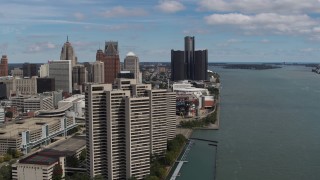 DX0002_189_001 - 5.7K aerial stock footage of flying away from skyscrapers and skyline, Downtown Detroit, Michigan