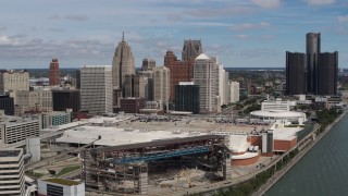 DX0002_189_004 - 5.7K aerial stock footage of a stationary view of the arena and skyline, Downtown Detroit, Michigan