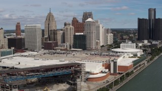 DX0002_189_006 - 5.7K aerial stock footage of the arena, convention center and skyline, Downtown Detroit, Michigan