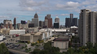DX0002_189_021 - 5.7K aerial stock footage ascend for a view of the skyline, Downtown Detroit, Michigan