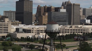 DX0002_189_044 - 5.7K aerial stock footage of orbiting a water tower in Downtown Detroit, Michigan