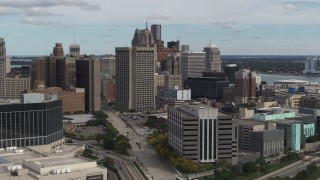 DX0002_190_008 - 5.7K aerial stock footage view of federal building while flying by hotel, Downtown Detroit, Michigan
